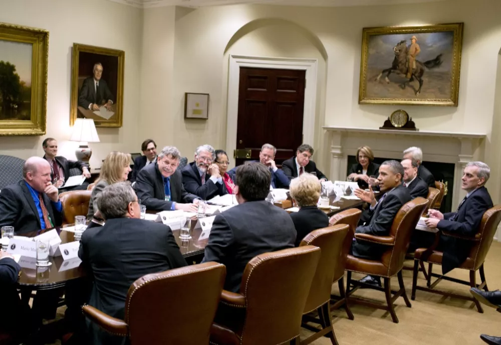 Dan Schraag, John Holdren and others at the White House with President Obama and President Biden