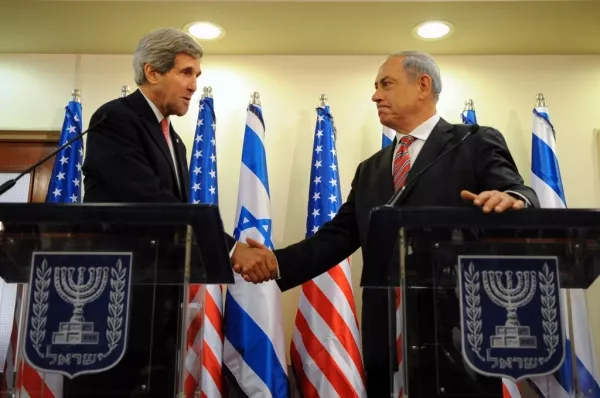 bibi kerry shake hands