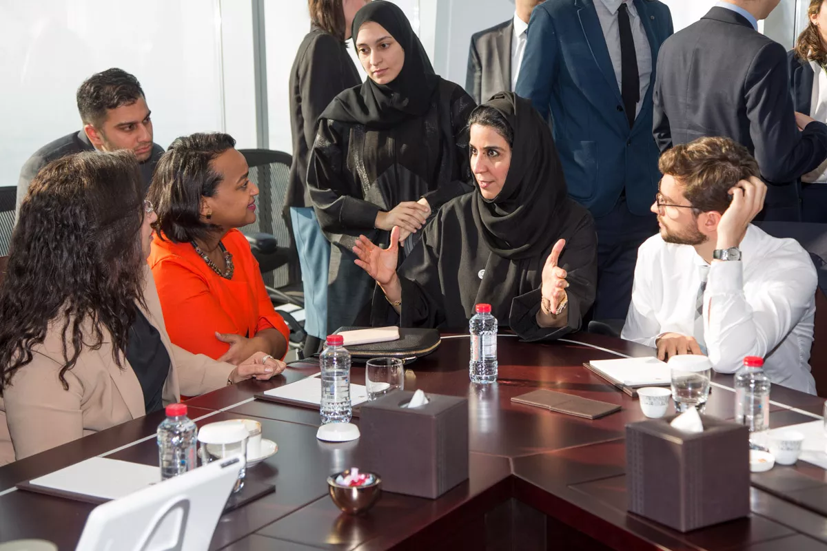 Students engage with HE Maryam Al Hammadi, Assistant Director General for Government Performance, at the Office of the Prime Minister in Dubai.