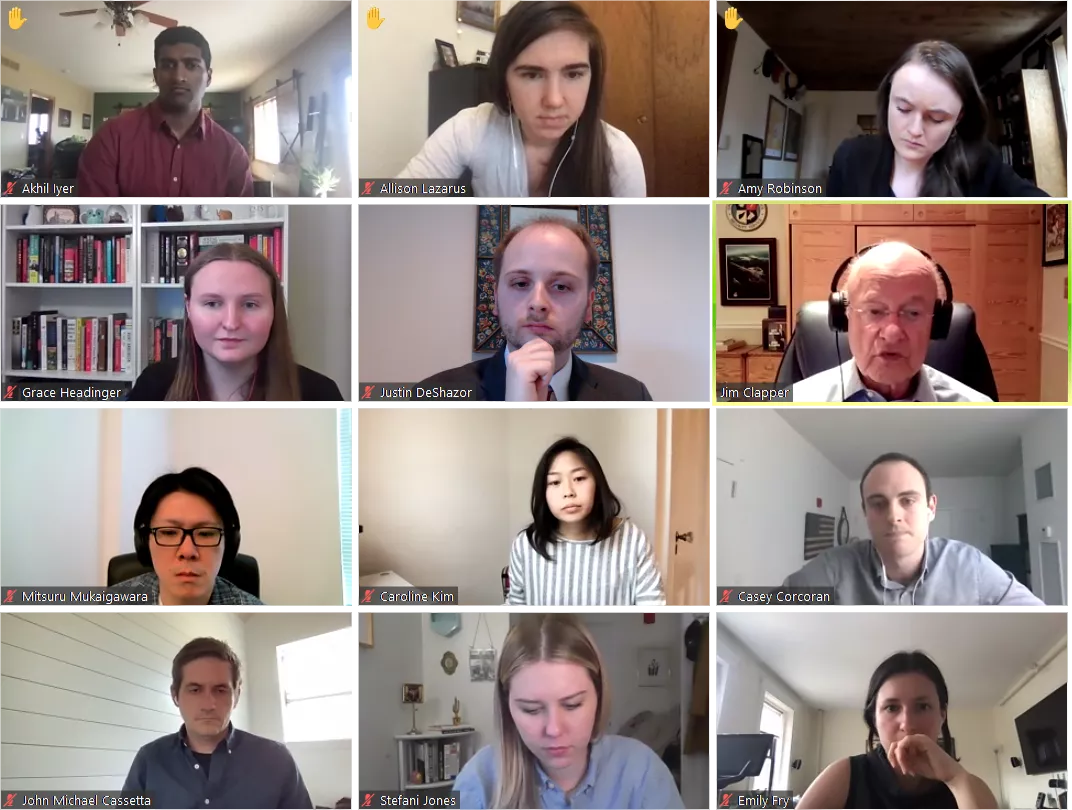 A Zoom screenshot of Justin DeShazor (second row, middle) moderating an event with Jim Clapper (second row, right). Other students fill the rest of the 12 videos in the grid.