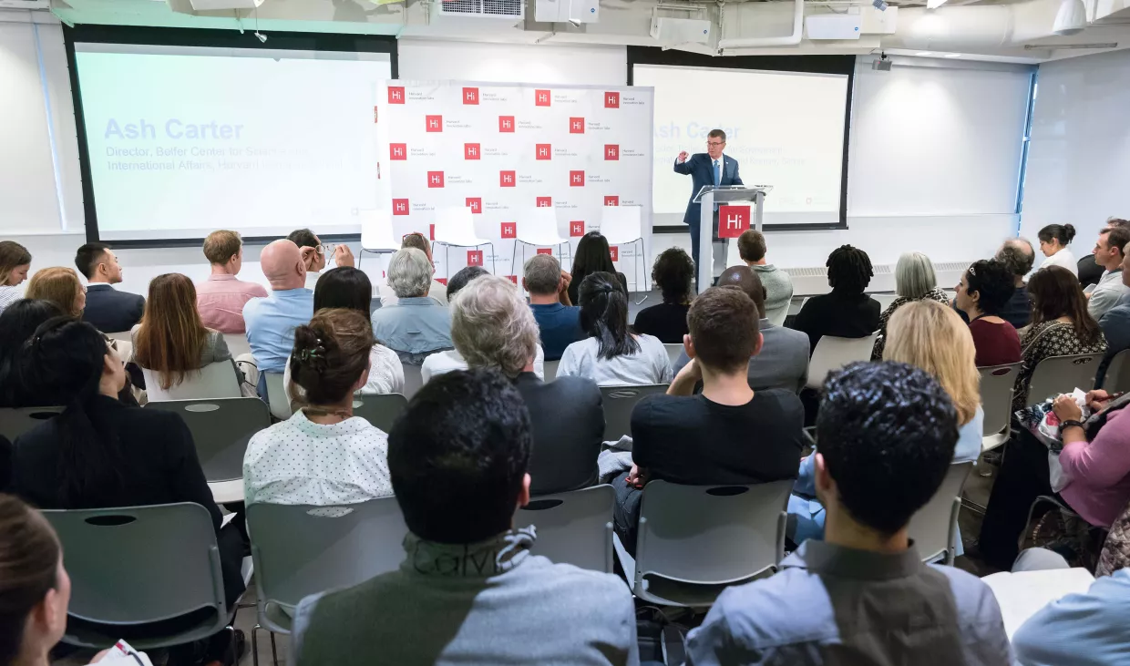 Ash Carter speaks to an audience at a HUBweek event at the Harvard Innovation Lab in 2018.