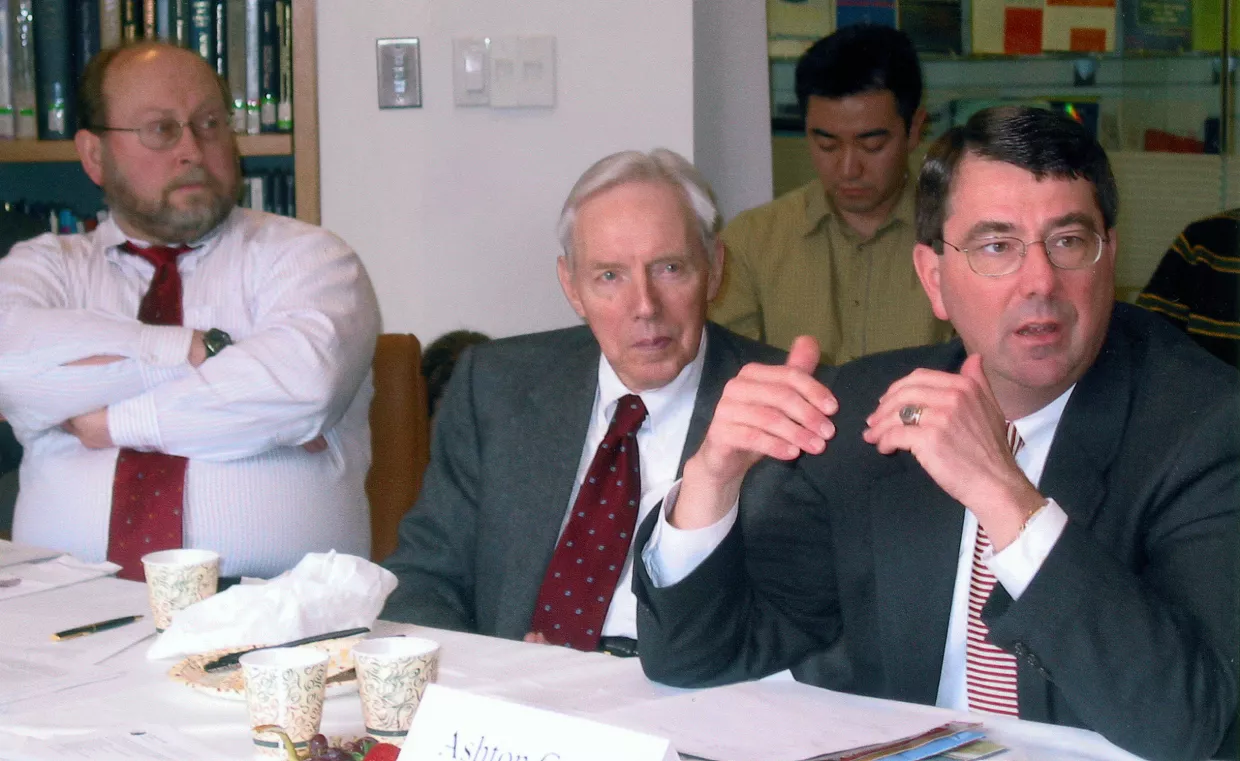 Steven Miller and Ernest May listen to a talk given by Ash Carter in the Belfer Center library in 2003.