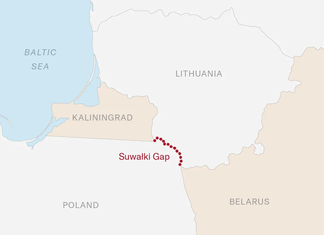 Map showing northeastern Poland and southern Lithuania, with the Suwałki Gap marked by a dotted line between Kaliningrad and Belarus. Poland, Lithuania, Belarus, and Kaliningrad are labeled, along with nearby cities such as Warsaw and Vilnius.