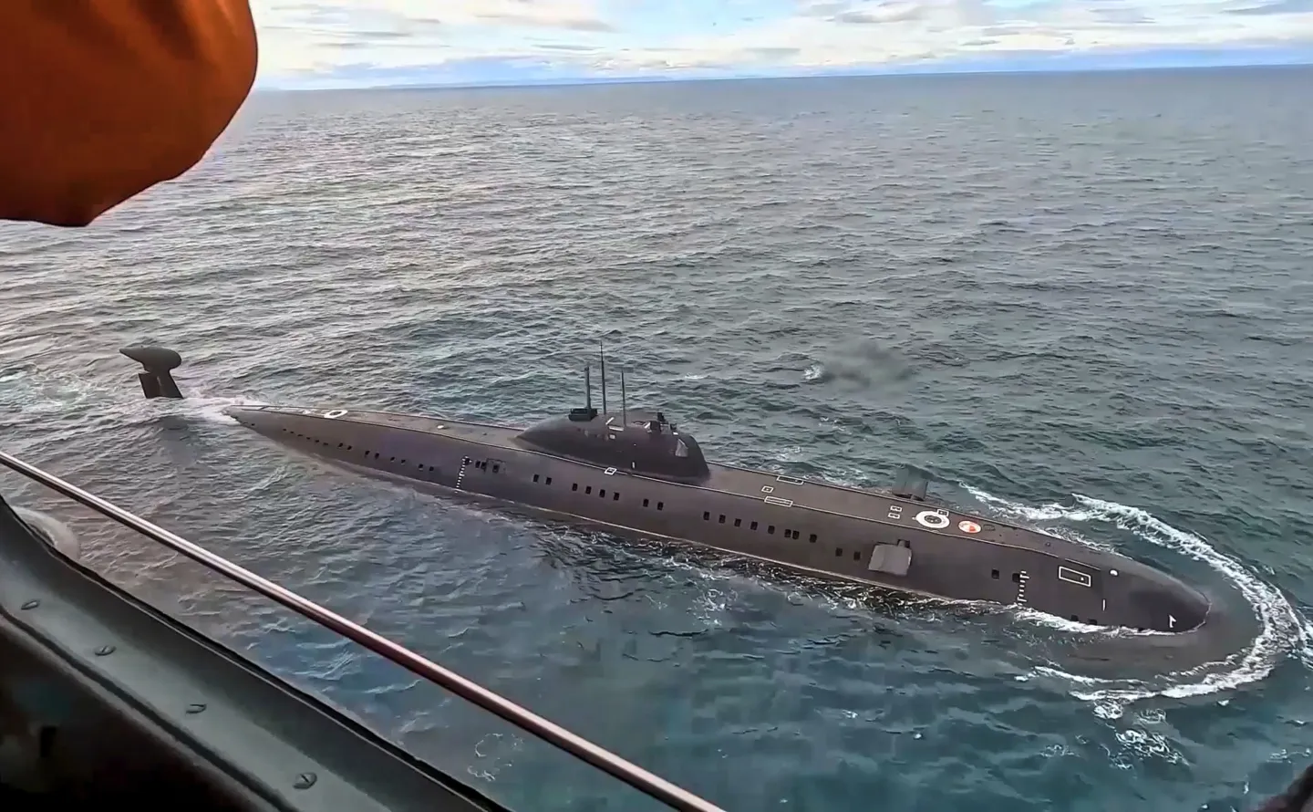 In this photo taken from video distributed by Russian Defense Ministry Press Service on Monday, Sept. 15, 2025, a Russian nuclear submarine is seen during drills in the Barents Sea. (Russian Defense Ministry Press Service via AP)