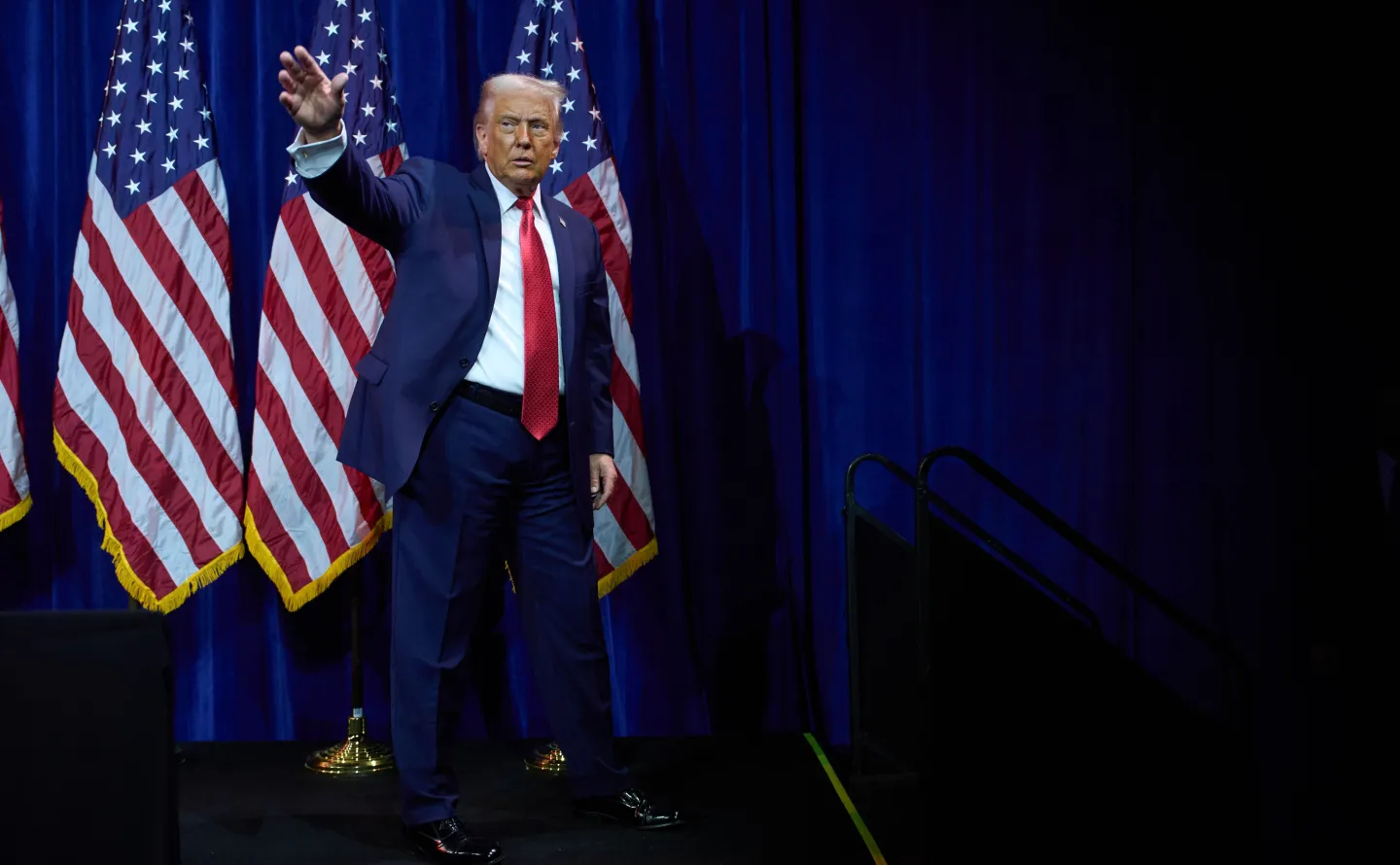 President Donald Trump waves as he walks off stage after speaking to House Republican lawmakers during their annual policy retreat, Tuesday, Jan. 6, 2026, in Washington. (AP Photo/Evan Vucci)