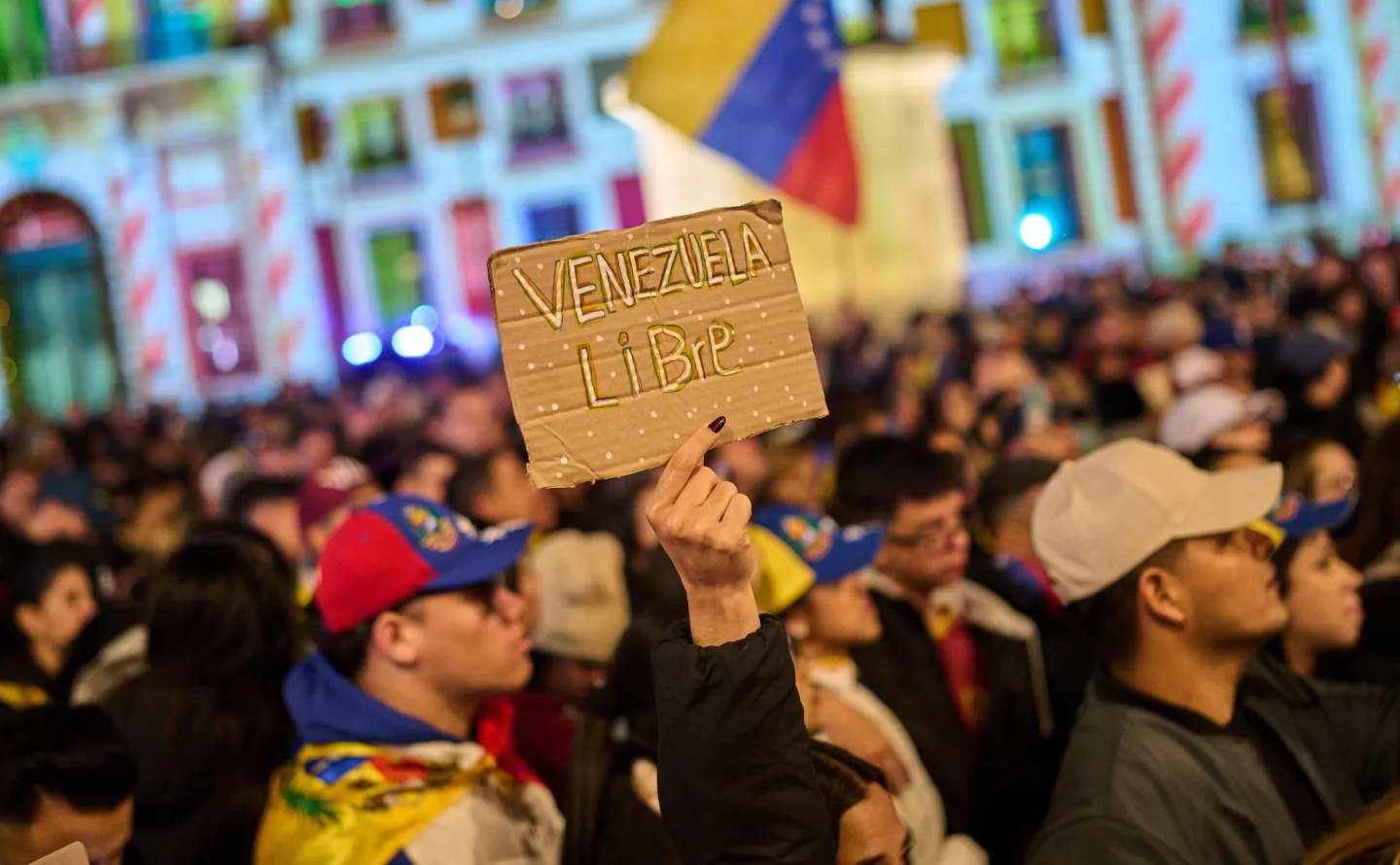 Venezuelans gather during a protest against deposed Venezuelan leader Nicolás Maduro in Madrid, Jan. 4, 2026. (AP Photo/Bernat Armangue)