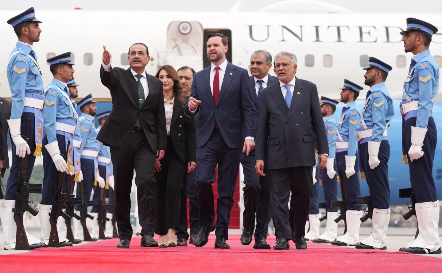 U.S. Vice President JD Vance, center, walks with Pakistan's Chief of Defence Forces and Chief of Army Staff Field Marshall Asim Munir, left, and Pakistani Deputy Prime Minister and Foreign Minister Mohammad Ishaq Dar after arriving for talks with Iranian officials in Islamabad, Pakistan, Saturday, April 11, 2026. (AP Photo/Jacquelyn Martin, Pool)