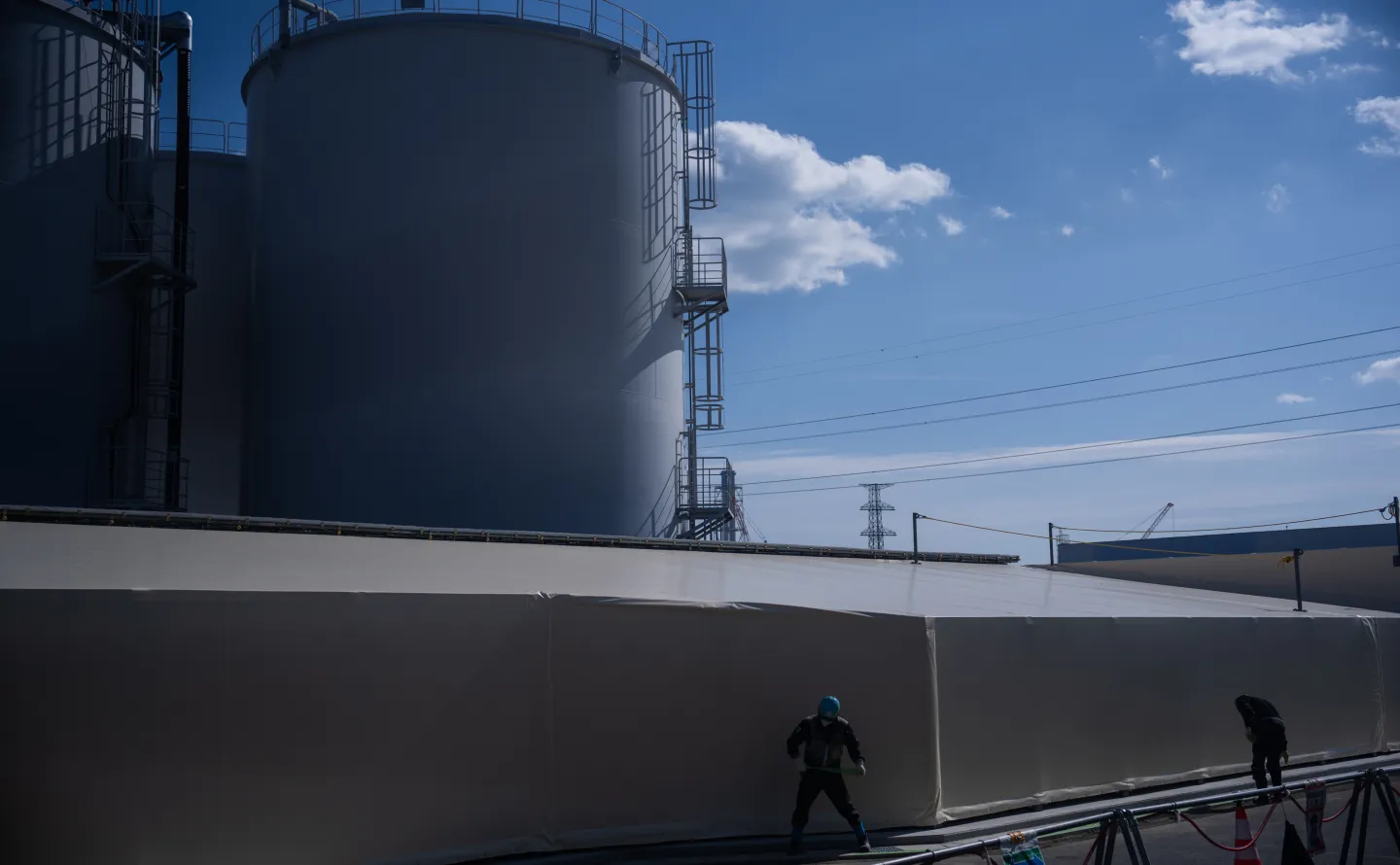 Water storage tanks set to be dismantled are visible at the Fukushima Daiichi nuclear power plant, operated by Tokyo Electric Power Company (TEPCO), in Okuma, Fukushima Prefecture, Feb. 12, 2026. (AP Photo/Louise Delmotte, File)