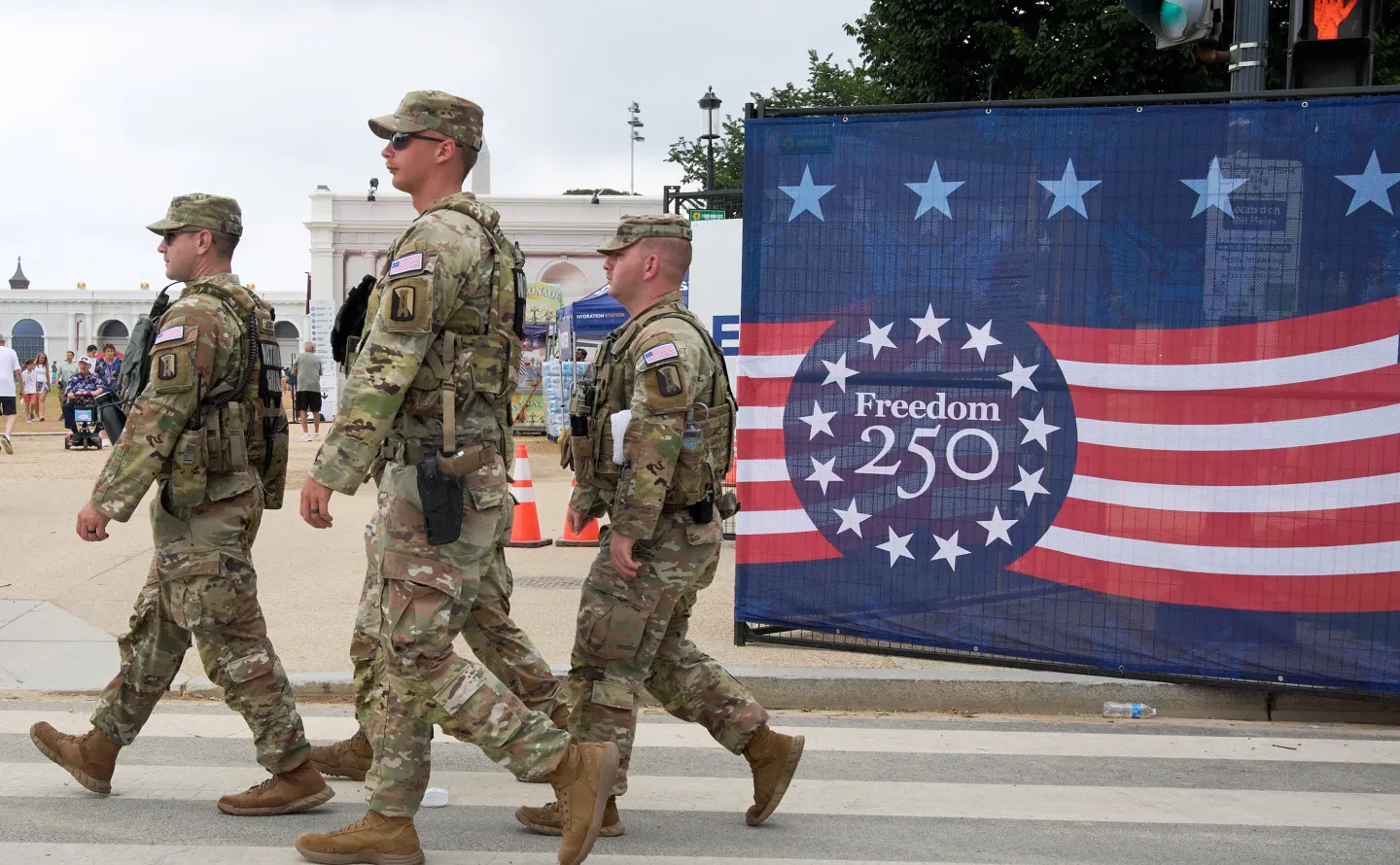 Soldiers from the Mississippi National Guard patrol along the Great American State Fair on the National Mall, Monday, July 6, 2026, in Washington. (AP Photo/Jacquelyn Martin)
