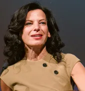 Juliette Kayyem speaking at a podium