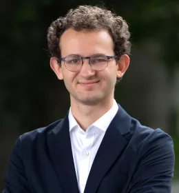 Jason Walter standing in the HKS courtyard.