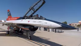 Air Force Secretary Frank Kendall sits in the front cockpit of an X-62A VISTA aircraft