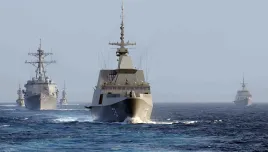The Singapore Navy frigate RSS Supreme (FFG 73), center, leads the guided missile destroyer USS Chung-Hoon (DDG 93), left, and the Singapore Navy corvette RSS Vigour (92) during maneuvers 