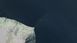 A satellite view of Little Diomede Island, Alaska, in the middle of the Bering Strait. 
