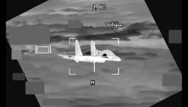 In this image made from video provided by U.S. Indo-Pacific Command, a People's Republic of China J-11 is seen from a U.S. Air Force B-52 aircraft, over the South China Sea on Oct. 24, 2023.