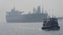 Liberia-flagged tanker Shenlong Suezmax, carrying crude oil from Saudi Arabia, that arrived clearing the Strait of Hormuz, is seen at the Mumbai Port in Mumbai, India, Thursday, March 12, 2026. 