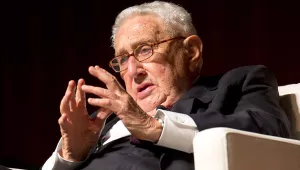 Kissinger speaks during a panel discussion.