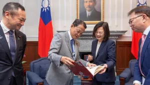Taiwan's President Tsai Ing-wen, center right, chats with Taro Aso, vice president of Japan's ruling Liberal Democratic Party during a visit to the Presidential Office in Taipei, Taiwan, Aug. 8, 2023. The senior Japanese politician advocated for increasing his country's deterrence ability to ensure peace in the region and called for that message to be clearly conveyed globally — particularly in China.