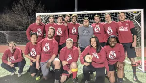 Photo of Guy Keeley with his soccer team Belfer FC.