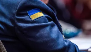 The flag of Ukraine on the uniform of Col. Hennadiy Kovalenko, staff officer, NATO Supreme Allied Commander Transformation HQ, in December 2019.