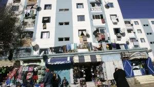 Residents are seen in a street of Bourouba, just outside Algiers.