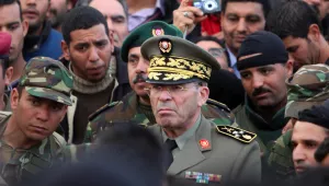 Gen. Rachid Ammar, center, speaks to protestors during a demonstration in Tunis, Monday, Jan. 24 2011. 