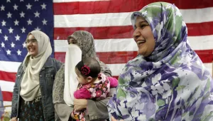 Photo of Pakistani immigrant family following naturalization. The father of the family was killed in a revenge killing post-9/11.