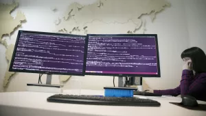 A computer code is seen on displays in the office of Global Cyber Security Company Group-IB in Moscow, Russia, Wednesday, Oct. 25, 2017. A new strain of malicious software has paralyzed computers at a Ukrainian airport, the Ukrainian capital's subway and at some independent Russian media. Moscow-based Global Cyber Security Company Group-IB said in a statement Wednesday the ransomware called BadRabbit also tried to penetrate the computers of major Russian banks but failed. 