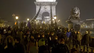 Thousands of protesters walk down Budapest’s famed Chain Bridge during an anti-government march in central Budapest, Hungary, Friday, Dec. 21, 2018.
