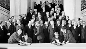 Signing of the SALT treaty between the U.S. and the U.S.S.R. is observed by officials as U.S. President Richard Nixon, left and Soviet leader Leonid Brezhnev, right, sign document in Moscow, May 26, 1972. (AP Photo)