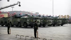 Chinese military vehicles carrying DF-17 ballistic missiles roll during a parade, Oct. 1, 2019. 