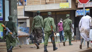 Ugandan police and other security forces chase people off the streets to avoid unrest after all public transport was banned for two weeks to halt the spread of the new coronavirus.
