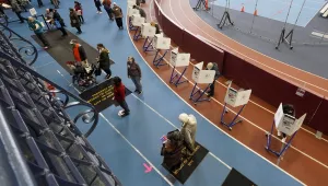Voters mark their ballots during early voting at the Park Slope Armory in Brooklyn, Tuesday, Oct. 27, 2020.