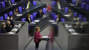 German Chancellor Angela Merkel delivers a speech about German government's policies to combat the spread of the coronavirus and COVID-19 disease at the parliament Bundestag, in Berlin, Germany, Thursday, Oct. 29, 2020.