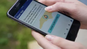 North Carolina' s cell phone app contact tracing SlowCOVIDNC is shown on Friday, Dec. 4, 2020, in Charlotte, N.C.