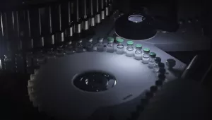 Image of vials inside of a device used in biological research. 