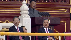 Photo of Chinese President Xi Jinping gesturing as he delivers a speech at a ceremony to mark the 100th anniversary of the founding of the ruling Chinese Communist Party at Tiananmen Gate in Beijing Thursday, July 1, 2021. 