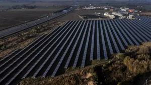 Solar field and biogas plant next to highway in Germany