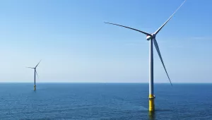 Photo of two of the offshore wind turbines which have been constructed off the coast of Virginia Beach, Va. are seen on Monday, June 29, 2020. 