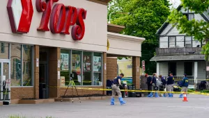 investigator outside supermarket in Buffalo New York
