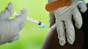 FILE - A health worker administers a dose of a Pfizer COVID-19 vaccine during a vaccination clinic in Reading, Pa., Sept. 14, 2021. 