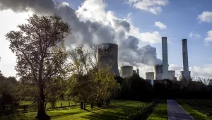 Steam rises from a coal-fired power plant.