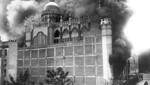 A Carmelite convent on fire in Madrid, Spain during riots.