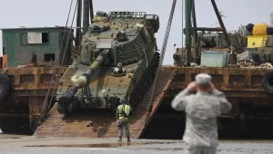 South Korean army's K-55 self-propelled artillery vehicle is unloaded from a barge during a Combined Joint Logistics Over-the-Shore exercise of U.S. and South Korea Combined Forces Command at the Anmyeon beach in Taean, South Korea, Monday, July 6, 2015. The U.S. and South Korean military joint exercise are held from June 29to July 9.
