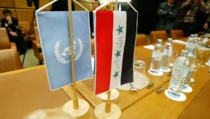  The U.N., left, and Iraqi flags sit on the table of the conference hall prior to the talks on details for a return of the U.N weapons inspectors to Iraq at the IAEA headquarters in Vienna, Austria, Monday, Sept. 30, 2002. 