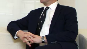 In this January 31, 2011 file photo, Niall Ferguson, Harvard University Professor of History, laughs during a meeting at the Moncloa Palace in Madrid. (AP Photo/Paul White, File) 