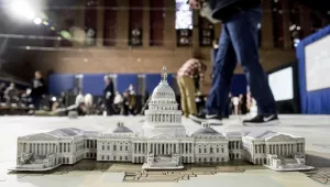 A model of the Capitol Building is displayed on a giant planning map during a media tour highlighting inaugural preparations Wednesday, Dec. 14, 2016, at the DC Armory in Washington. (AP Photo/Andrew Harnik)