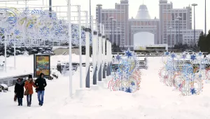 People walk in Astana, Kazakhstan, on Jan. 23, 2017. (AP Photo/Sergei Grits)