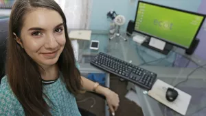 Celiah Aker, who is enrolled in an online charter school named the Electronic Classroom of Tomorrow or ECOT, poses for a photo at her desk in her home in Medina, Ohio on Fubruary 06, 2017. (AP Photo/Tony Dejak, File)