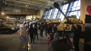 Visitors walk past a display of Cold War-era tanks at the Royal Tank Museum in Amman, Jordan on Thursday, February 1, 2018. (AP Photo/Sam McNeil)